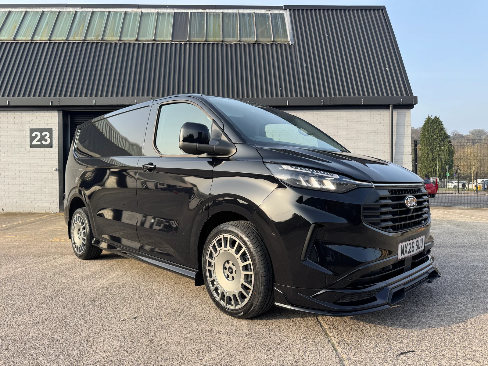 Ford Transit Custom GV Sport panel van in black — front three-quarter